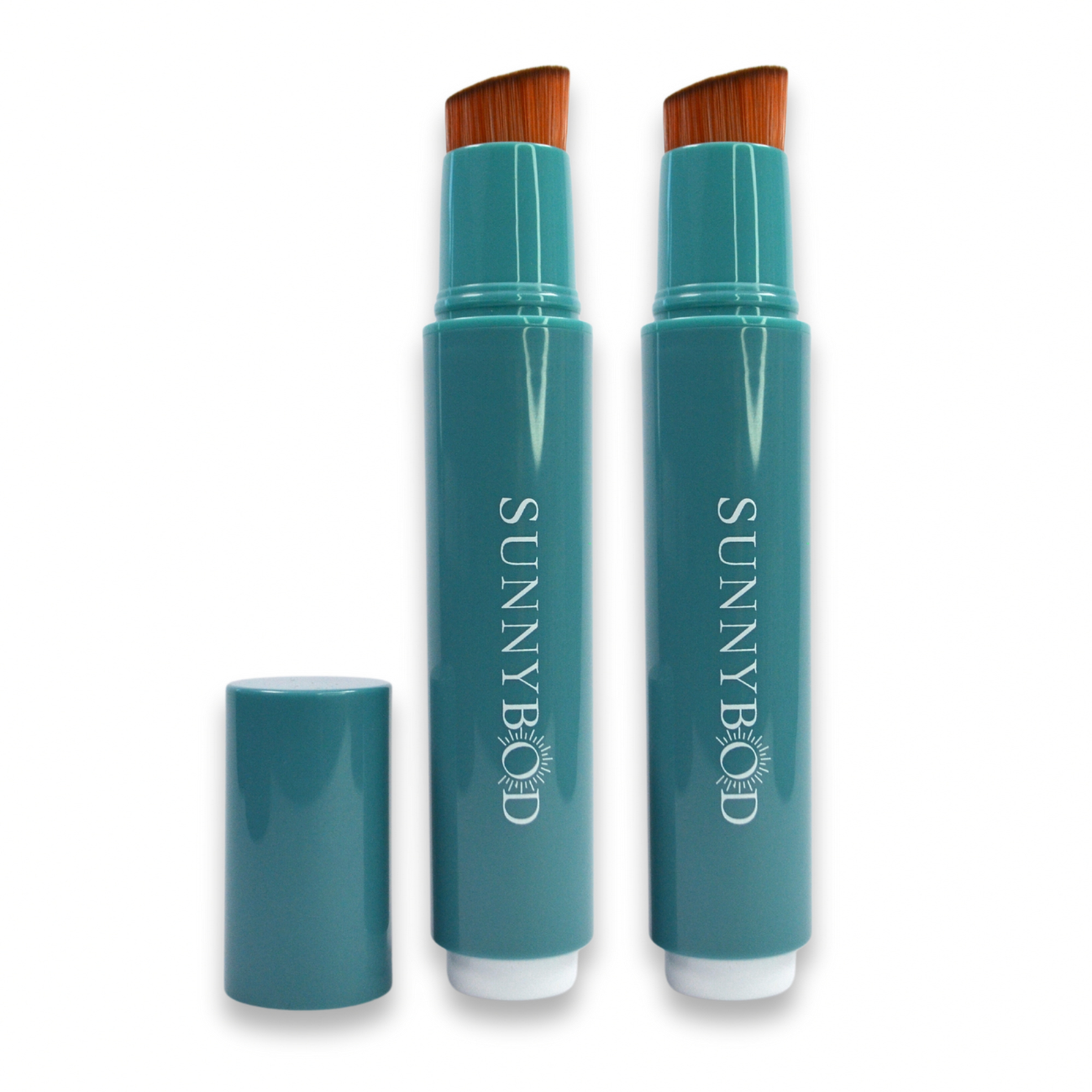 The picture shows two SUNNYBOD™ Refillable Sunscreen Brush Applicator's side by side. The brush is turquoise. The susncreen brush bristles are light brown. The handle has the word "SUNNYBOD" written in white capital letters. There is also a turquoise cap next to the brush that can be placed on the brush to cover the bristles. The brush is placed on a white background.