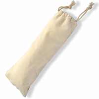 The picture shows the back view of an off white cotton fabric SUNNYBOD™ Sunscreen Brush travel Pouch. The pouch has a drawstring at the top for opening and closing. The pouch is displayed on a white background.